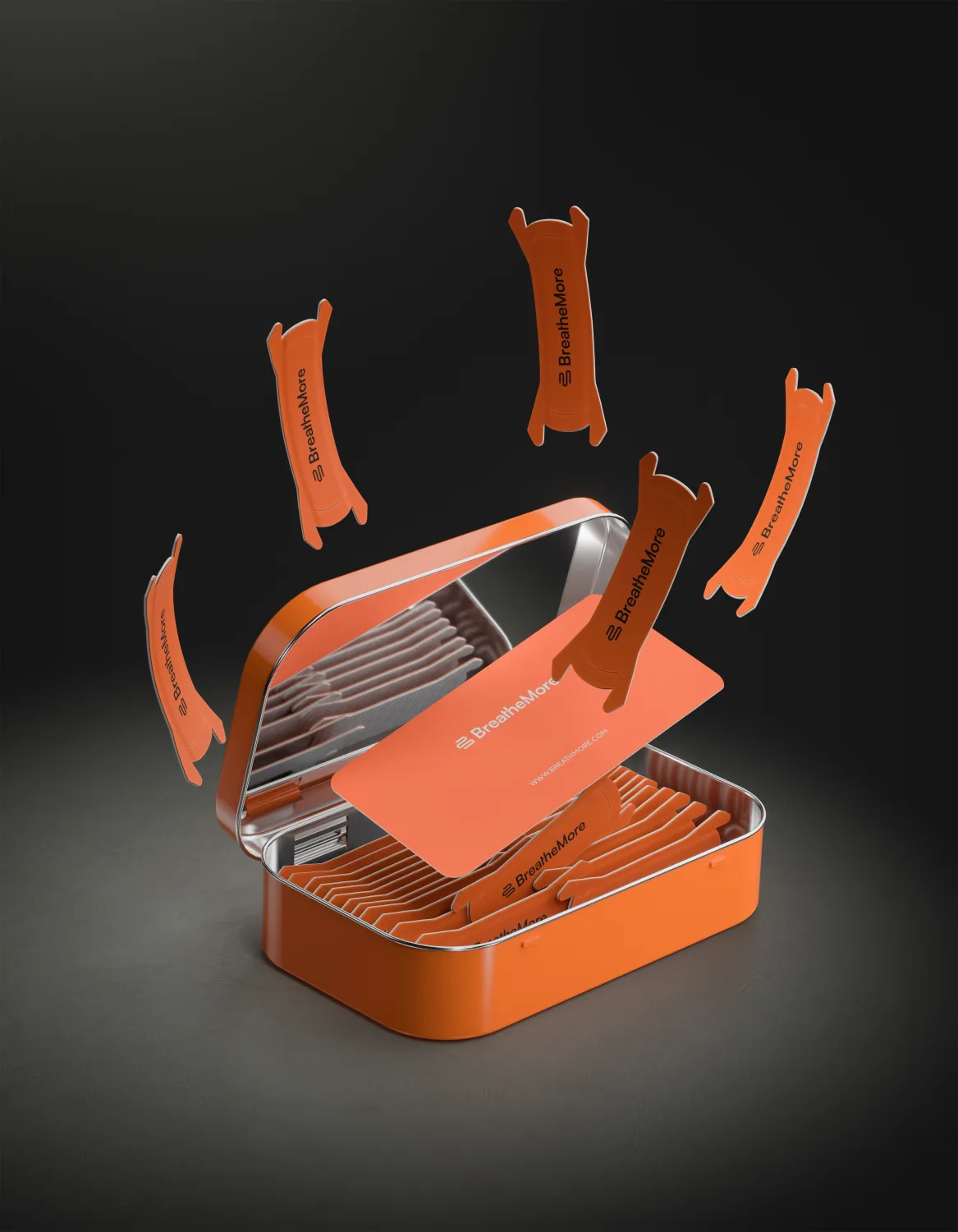 Open orange BreatheMore tin with floating nasal strips against a dark background